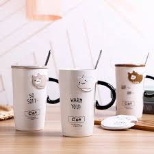 A cup of cappuccino on a blue saucer on a wooden table in the cafe. Creative Big Mug Coffee Cup Embossed Ceramic Cup With Lid Cartoon Cat Mug For Custom Buy Big Mug Mug Coffee Cup Ceramic Mug Custom Product On Alibaba Com