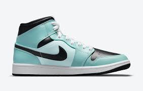 A gold tone and black version. Air Jordan 1 Mid Teal Tint Bq6472 300 Release Date Sbd
