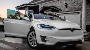 Tesla model x falcon wing doors part 2/2. White Tesla Model X With All The Doors Open In A Driveway In Sugarloaf Country Club Tesla Model X Tesla Model Dream Cars