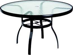 Our commercial outdoor dining tables have been featured at hotels, hoa communities, public swimming pools, and cruise ships all over the world! Woodard Aluminum Deluxe 48 Wide Round Obscure Glass Top Table With Umbrella Hole Wr826148w