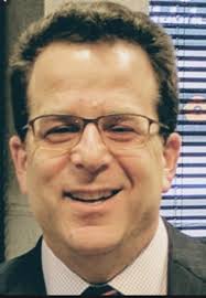 Ex-CEO at Bank Acquired by CU Wins $500K Settlement