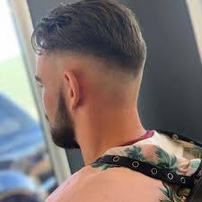 Essentially, a taper fade is a cut that goes from one length to another (from the top of the head, down to the sides, and to the nape of the neck). 25 Best Slicked Back Undercuts For Men 2020 Update