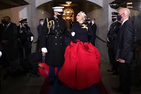 Pop icon lady gaga's debut album, 'the fame,' included the hits just dance and poker face. she also won a golden globe for her role in 'american horror story' and an oscar nomination for her. Lady Gaga Wears Schiaparelli Couture Ball Gown To Joe Biden S Inauguration