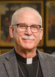 Rev. Robert Wurst Jr. (-)