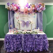 Include butterfly and flower decorations, themed desserts, and party favors to complete the theme. Jb Crafts Butterfly Theme Baby Shower Main Table Facebook