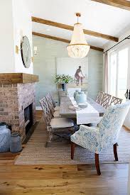 I've found one of my favorite ways to relax is to search for furniture for a house i don't own and put together mood boards. Coastal Dining Room With Grasscloth Wallpaper Brick Fireplace And Glass Chandelier Millhaven Homes Caitlin Dining Room Cozy Coastal Dining Room Home Decor
