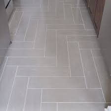 Redd Hogan Design Build On Instagram We Did This Herringbone Tile On A 90 Degree Angle To Help V Herringbone Tile Floors Herringbone Floor Herringbone Tile