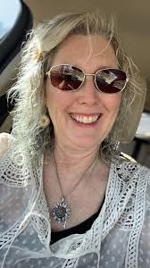 55 and I've been growing my hair out it's been cut in long bob for many  years. Natural curl look here.