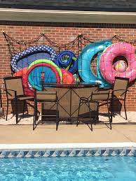 See more ideas about pool float storage, pool, pool storage. Our Solution For A Backyard Bar Cargo Net Swimming Pool Float Storage Area Pool Float Storage Pool Decor Pool Toy Storage