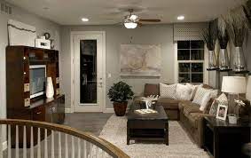 Living Room Design Gray Wood Flooring Brown Sofa Wooden Coffee Table White Table Lamp Brown Living Room Brown Living Room Decor Living Room Leather