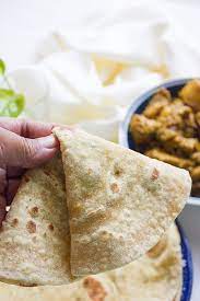 Pulka Or Phulka Is An Indian Flatbread It Is Soft And Light Perfect With Gravies Get The Recip Easy Soft Flatbread Recipe Soft Flatbread Recipe Indian Bread