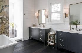 His and her bathroom vanities. Black Bathroom Vanity With Gold Mirrors Transitional Bathroom