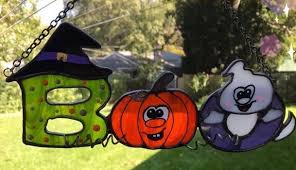 Take a rectangle of black construction paper and draw a halloween picture onto it leaving a frame around the edge as. Halloween Stained Glass Living Sun Glass