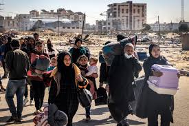 Displaced Palestinians flee from Khan Younis in the southern Gaza Strip on Jan. 30.  Mahmud Hams / AFP via Getty Images