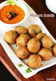 Mysore bonda are crisp, soft and fluffy fritters made with urad dal (black gram), spices and fresh coconut bits. Mysore Bonda Recipe How To Make Bonda Instant Bonda Recipe