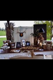 Grooms Table For The Deer Hunter Real Horns Pictures Cupcakes And The Grooms Favorite Cookie Factory Cooki Grooms Cake Tables Grooms Table Bride Groom Table