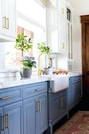 Blue Kitchen Cabinets White Suspended Cabinets And Dusty Blue Cabinets On The Floor Look Lightweight A Kitchen Renovation Kitchen Remodel Blue Kitchen Cabinets