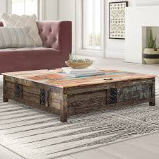 4.5 out of 5 stars 1,399. Bungalow Rose Donah Solid Wood Coffee Table With Storage Reviews Wayfair