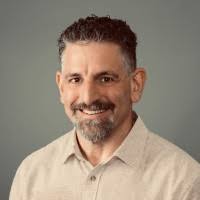 Chris-Michael Carangelo, CIC, ARM, AU, CRIS