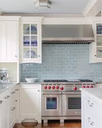 However, for those who want a touch of blue color without being overwhelmed, complimenting a white kitchen with blue backsplash may be the perfect choice. Berling Small Flush Mount Blue Tile Backsplash Kitchen White Modern Kitchen Kitchen Design