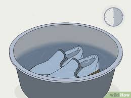 After the washing machine is turned on and filled with water, slightly open the. 3 Ways To Remove Yellow Bleach Stains From White Shoes Wikihow
