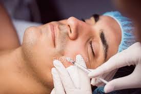 Botox has been approved by the fda to smooth moderate to severe wrinkles on three areas: Man Receiving Botox Injection On Face At Clinic People Consulting Stock Photo 225297920