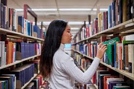 Image result for student standing in library