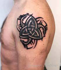 A beautiful celtic cross tattoo that can be shared by members of a family who have celtic roots and faith in christianity. Top 28 Best Celtic Tattoos Ideas For Both Men And Women Tattooed Martha