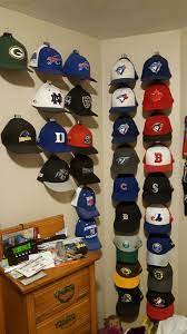 Hang Your Hats With Binder Clips And Push Pins In The Wall Displays The Hats Amazing Wall Hats Hanging Hats Hat Wall