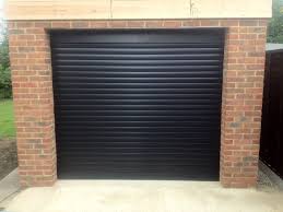 rsg7000 electrically operated security roller garage doors fitted externally to a residential complex in tooting garage doors roller doors plastic shutters