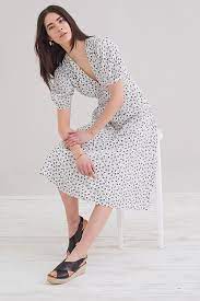 Perfect for weekend bbq's and friends weddings, theses are the dress up/dress down no brainers. Faithfull The Brand Puff Sleeve Midi Dress Anthropologie Uk
