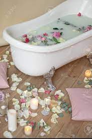 Choose the perfect bubble bath for the occasion. Romantic Bubble Bath With Roses And Candles For Aroma Therapy Stock Photo Picture And Royalty Free Image Image 92290639