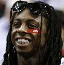 Lil' Wayne. Iced Gold Teeth.