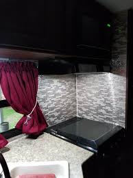 She used peel and stick vinyl floor tiles in her basement makeover, turning the space into an attractive space for crafting and spending time with her kids. 17 Peel And Stick Kitchen Rv Backsplash Ideas The Crazy Outdoor Mama