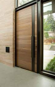 Cette annee nos nouveautes se concentrent sur deux materiaux en vogue. Porte D Entree Moderne Pour Habiller La Grande Hauteur Sous Plafond