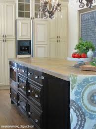 To Get These High Gloss Black Cabinets For Her Kitchen Island She Had Her Local Auto Body Shop Spray Pai Stock Cabinets Espresso Kitchen Cabinets Kitchen Redo