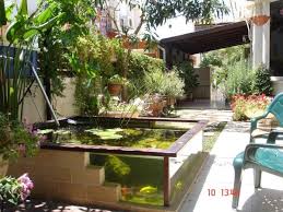 How To Build A Glass And Brick Pond Monsterfishkeepers Com Ponds Backyard Backyard Pool Landscaping Backyard Water Feature Diy