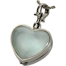 Check out our pet cremation jewelry selection for the very best in unique or custom, handmade pieces from our cremation & memorial jewelry shops. Pet Urn Jewelry Victorian Glass Locket Lock Of Fur Glass Heart