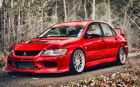It's a postage stamp of grass and asphalt. Download Wallpapers Mitsubishi Lancer Evolution Ix Tuning Hdr Supercars Autumn Red Lancer Mitsubishi Lancer Evo 9 Japanese Cars Mitsubishi For Desktop Free Pictures For Desktop Free