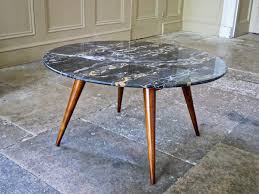 This coffee table is built from ash and walnut. Mid Century Coffee Table Italian Design Marble Alto Stile