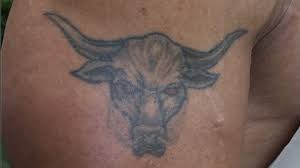 The Rock Gives His Signature Bull Tattoo A Gigantic Badass Update Bull Tattoos Tattoos The Rock