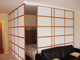 This divider stands 84 inches tall and is ideal for rooms with high ceilings or for when greater privacy is preferred. Image Result For 3 Track Shoji Screen Glass Room Divider Sliding Room Dividers Room Divider Walls