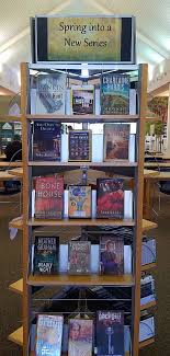 Spring Into A New Series Book Theme Book Kiosk Sulphur Regional Library March Book Display Library Displays Book Display Library Book Displays