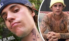 Nick cannon and mariah carey wallpaper & images. Justin Bieber Thinks His Rose Tattoo Will Be The Last Piece On His Neck That S A Hailey Request Daily Mail Online
