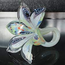 The two lines are based on the same concept: Antiques Atlas Murano Glass Flower With Twisted Stem