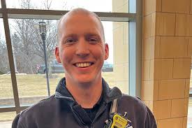 Alumnus earns fire department honor for off-duty medical assistance at  scene of car crash