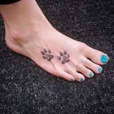 Dog paw prints tattoo on foot. Small Dog Paw Tattoo On Foot Novocom Top