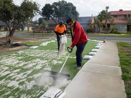Use a spreader machine to distribute the artificial grass infill. How To Install Artificial Grass Diy Guide Next Generation Turf