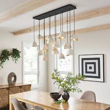 The light is suspended from a long chain that can be shortened to suit your needs. Dining Room Pendant Lighting Ideas How To S Advice At Lumens Com