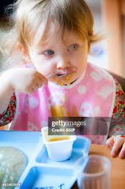 84 Eating Apple Sauce Stock Photos, High-Res Pictures, and Images